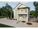 Charming two-story home featuring a quaint balcony, gravel landscaping, and a welcoming entrance at 13615 E 103Rd Ave, Commerce City, CO 80022