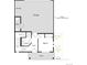 Floorplan showcases the layout of the garage level, featuring a porch, foyer, and second bedroom at 13615 E 103Rd Ave, Commerce City, CO 80022