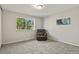 Bedroom featuring plush carpet and a window at 2246 N Coronado Pkwy # A, Denver, CO 80229