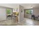 Bright dining area featuring tile floors and bar top at 2246 N Coronado Pkwy # A, Denver, CO 80229