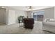Relaxing living room with sliding glass door and comfortable seating at 2246 N Coronado Pkwy # A, Denver, CO 80229