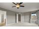 Generous bedroom with view to en-suite bathroom and walk-in closet is bright and airy at 3672 S Perth Cir # 101, Aurora, CO 80013