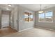 Spacious entryway with tile and wood flooring, plus ample natural light at 3672 S Perth Cir # 101, Aurora, CO 80013