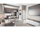 Modern kitchen with stainless steel appliances, sleek cabinetry, and eat-in dining area at 1643 Boulder St # 205, Denver, CO 80211