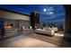 Rooftop terrace with built-in grill, fireplace, and comfortable seating offers city views at 1643 Boulder St # 205, Denver, CO 80211