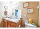 Bathroom features a double sink vanity at 10487 W Hampden Ave # 101, Lakewood, CO 80227