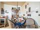 Dining room featuring seating for four and a hutch at 10487 W Hampden Ave # 101, Lakewood, CO 80227