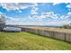 Spacious backyard with views of the surrounding neighborhood and mountain skyline at 11321 N Brownstone Dr, Parker, CO 80138