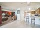 Open-concept living space combining the kitchen and living room for easy entertaining at 11321 N Brownstone Dr, Parker, CO 80138