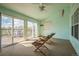 Relaxing sun room with outdoor access at 11321 N Brownstone Dr, Parker, CO 80138
