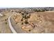 Aerial view of a community dog park with walking trails, play areas, and landscaping at 4475 Hidden Gulch Rd, Castle Rock, CO 80104