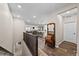 Open concept foyer with hardwood floors throughout and lots of natural light at 4475 Hidden Gulch Rd, Castle Rock, CO 80104