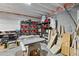 Unfinished basement with ample storage space, shelving, and visible ceiling beams at 4475 Hidden Gulch Rd, Castle Rock, CO 80104
