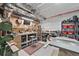 Well-organized basement workshop with workbenches, tools, and storage solutions at 4475 Hidden Gulch Rd, Castle Rock, CO 80104