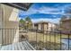 Balcony view of the surrounding grassy courtyard of the condo community on a sunny day at 12174 Melody Dr # 203, Westminster, CO 80234