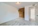 Bedroom with carpet, an installed closet organizer, and a view to the hall at 12174 Melody Dr # 203, Westminster, CO 80234