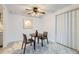 Dining area with ceiling fan, adjacent to the living room, ideal for casual meals at 12174 Melody Dr # 203, Westminster, CO 80234