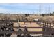 Dog park with fencing and a bench for pet owners to relax at 9028 S Catawba St, Aurora, CO 80016