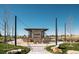 Outdoor space with fire place, comfortable seating, and manicured grass at 9028 S Catawba St, Aurora, CO 80016