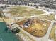 Aerial view of a playground area with swings, slides, and other play structures at 9028 S Catawba St, Aurora, CO 80016