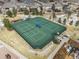 Aerial view of tennis courts in the community with some snow on the ground at 9028 S Catawba St, Aurora, CO 80016