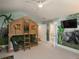 This themed ' bedroom includes a custom-built treehouse bunk bed with tropical mural at 18 Foxtail Cir, Englewood, CO 80113