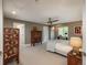 Large bedroom featuring decorative chest and carpeted floors at 18 Foxtail Cir, Englewood, CO 80113