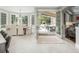 Open dining room extends to outdoor patio through French doors at 18 Foxtail Cir, Englewood, CO 80113