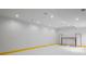 Fun game room with a hockey rink, white paneled walls, and recessed lighting at 18 Foxtail Cir, Englewood, CO 80113