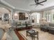Open-concept living area features hardwood floors and custom architectural details at 18 Foxtail Cir, Englewood, CO 80113