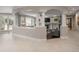 Spacious living room with fireplace and detailed column accents at 18 Foxtail Cir, Englewood, CO 80113