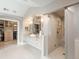 The main bathroom features dual sinks, a shower, and a walk-in closet at 18 Foxtail Cir, Englewood, CO 80113