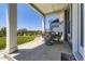 Inviting covered patio features comfortable seating and a serene outdoor atmosphere at 3344 Carabiner St, Castle Rock, CO 80108