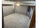 Basement area with built-in storage and a small window at 3613 S Olathe St, Aurora, CO 80013