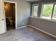 Comfortable bedroom with carpet, ensuite bathroom and two windows, creating a peaceful retreat at 3613 S Olathe St, Aurora, CO 80013