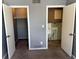 A gray bedroom shows closet and staircase entrances, offering space and flow at 3613 S Olathe St, Aurora, CO 80013