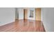 Bedroom area with wood flooring, white walls, and large closet, offering ample space at 7995 E Mississippi Ave # C1, Denver, CO 80247
