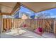 Covered patio view, showcasing the townhome exteriors and a fenced-in yard at 7995 E Mississippi Ave # C1, Denver, CO 80247