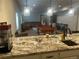 Finished basement with kitchenette, pool table, bar and entertainment area at 5204 Lake Port Ave, Longmont, CO 80504