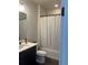 Clean and well-maintained bathroom with a sink, toilet, and shower at 5204 Lake Port Ave, Longmont, CO 80504