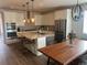 Kitchen with stainless steel appliances, granite counters, and pendant lighting at 5204 Lake Port Ave, Longmont, CO 80504
