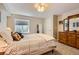 Comfortable bedroom with neutral colors, plush carpet, and a cozy atmosphere at 9229 Sugarstone Cir, Highlands Ranch, CO 80130