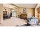 Spacious, open-concept living room featuring high ceilings and ample natural light at 9229 Sugarstone Cir, Highlands Ranch, CO 80130