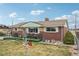 Lovely home exterior with a well-manicured lawn and charming front porch at 3540 E 90Th Pl, Thornton, CO 80229