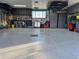 Organized two car garage features epoxy floors, cabinets, work bench and plenty of storage at 3540 E 90Th Pl, Thornton, CO 80229