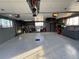 Spacious garage features epoxy flooring and ample storage cabinets at 3540 E 90Th Pl, Thornton, CO 80229