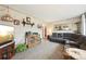 Inviting living room with cozy seating, stylish decor, and a serene atmosphere at 3540 E 90Th Pl, Thornton, CO 80229