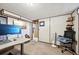 Finished basement office space features a desk, chair and shelving at 3540 E 90Th Pl, Thornton, CO 80229