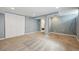 Finished basement with carpet floors, neutral paint and a closet for storage at 1610 Trenton St, Denver, CO 80220