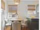 Bright dining space with natural light and wood floors at 1610 Trenton St, Denver, CO 80220
